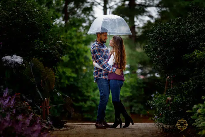 romantic engagement photos session in Green Spring Garden Virginia on a rainy day.